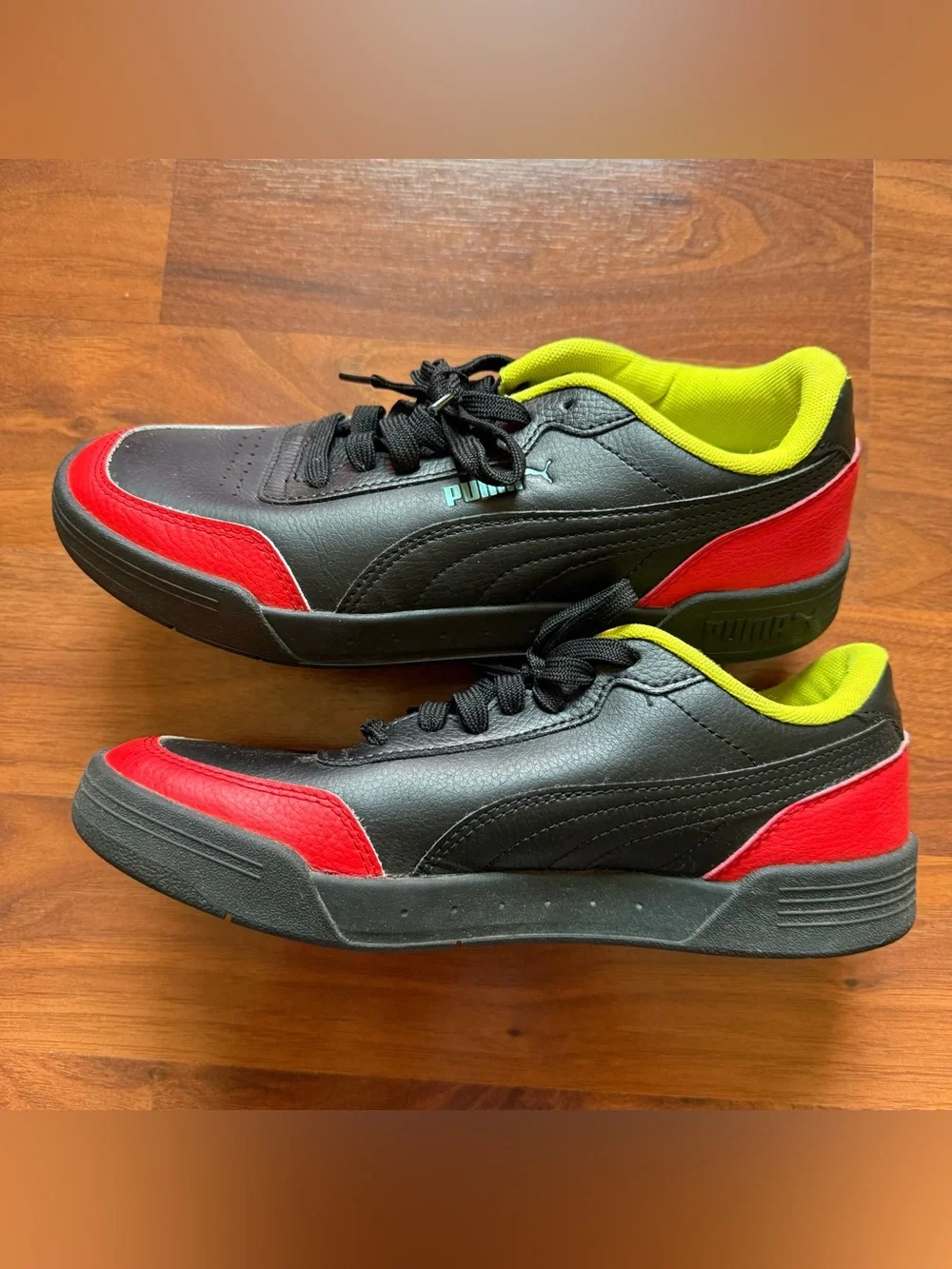 Puma Caracal sneakers men's size 7.5 women's size 9 black high-risk red nrgy